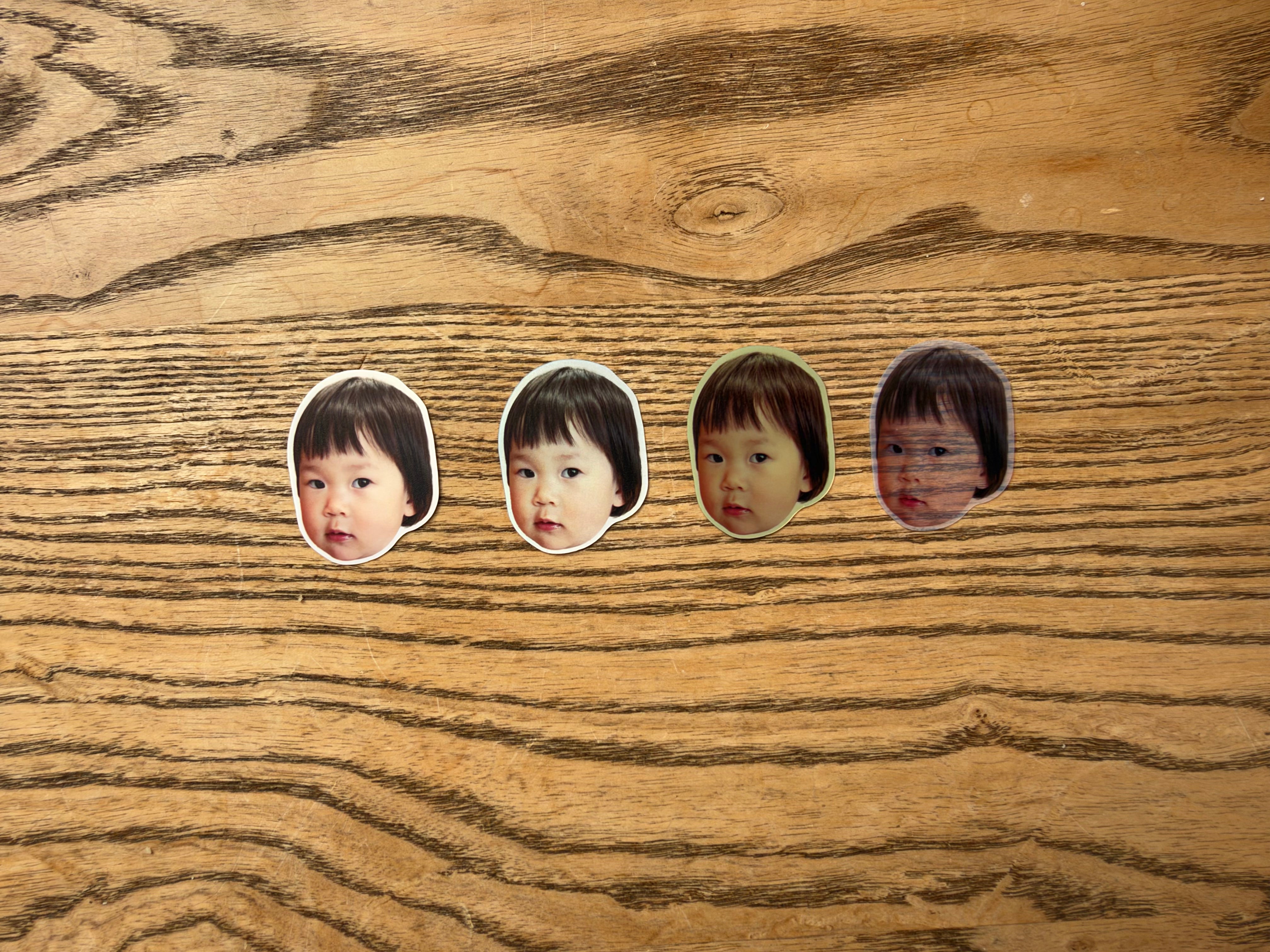 White Matte — Portrait sticker sample photographed on wood