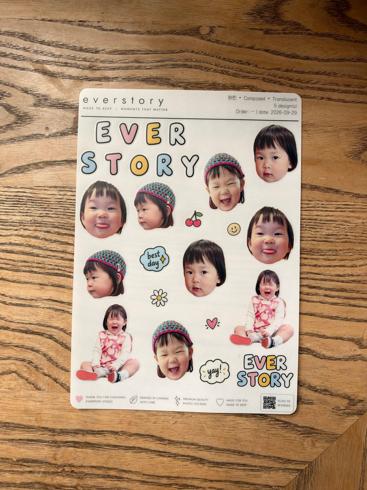 Translucent sticker sheet photographed on wood