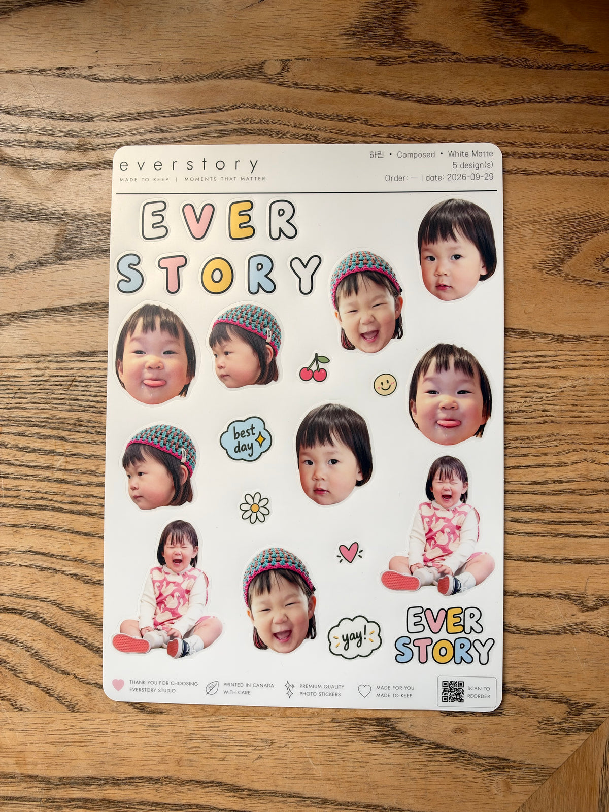 White Matte sticker sheet photographed on wood